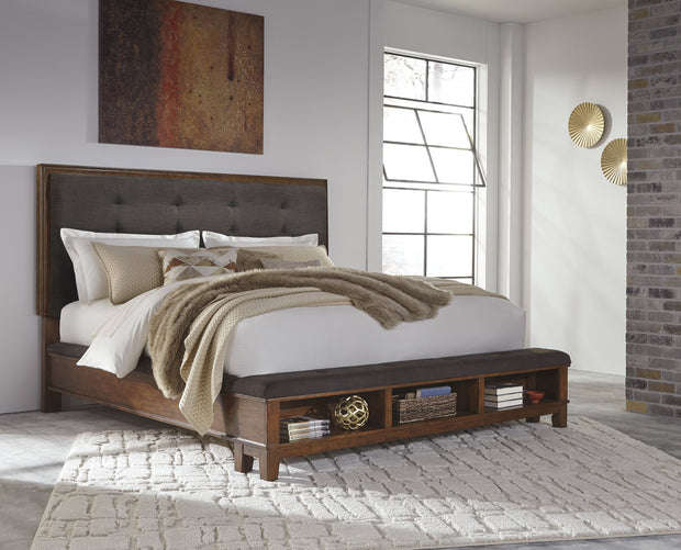 Ralene Medium Brown King Storage Upholstered Panel Bed