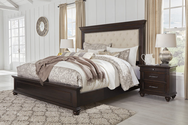 Brynhurst Dark Brown Queen Upholstered Panel Bed